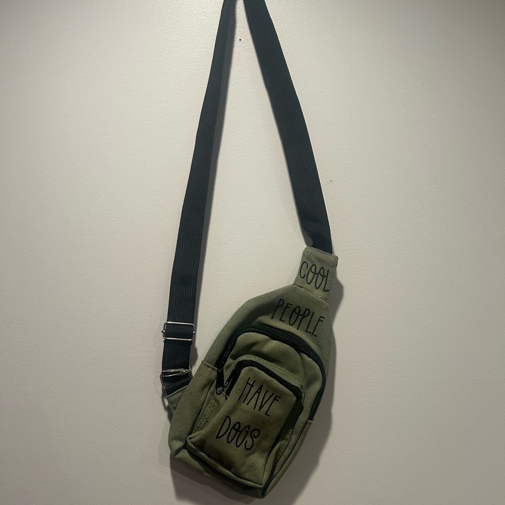 Green and Black Backpack with Adjustable Straps and Durable Material